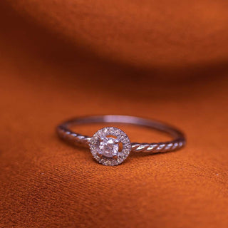 1/8 Carat Diamond Halo Diamond Ring in Sterling Silver
