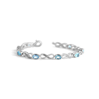 4.8 Carat Oval Swiss Blue Topaz Infinity Linked Diamond Tennis Bracelet in Sterling Silver-7.50''