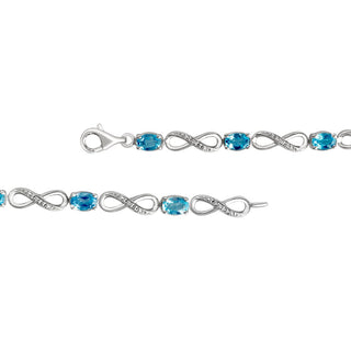 4.8 Carat Oval Swiss Blue Topaz Infinity Linked Diamond Tennis Bracelet in Sterling Silver-7.50''
