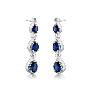2.6 Carat Pear Shaped Blue Sapphire and Diamond Graduating Drop Earrings in Sterling Silver