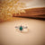 1/2 Carat Oval Shaped Emerald and Diamond Starry Ring in Sterling Silver